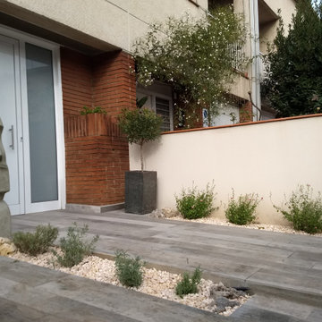 DISEÑO Y CONSTRUCCIÓN JARDÍN Y SOLARIUM CASA APAREADA