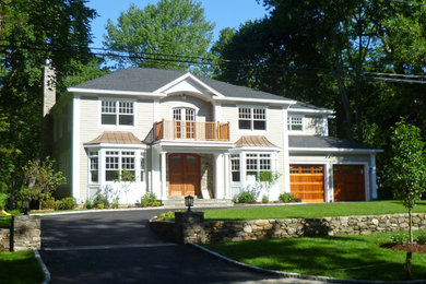This is an example of a large traditional two-storey exterior in New York.