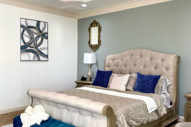 Inspiration for a large transitional master carpeted bedroom remodel in Dallas with beige walls and no fireplace