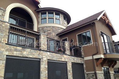 Transitional backyard deck photo in Calgary with no cover