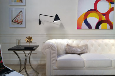 Inspiration for a mid-sized contemporary formal and loft-style light wood floor living room remodel in Miami with white walls, no fireplace and no tv