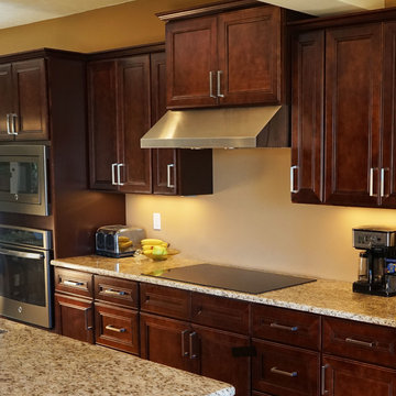 Leo Saddle Cherry Mahogany Kitchen Cabinets w/ Soft Close by Everyday Cabinets