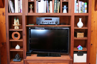 Family room - large traditional family room idea in Portland Maine with a media wall
