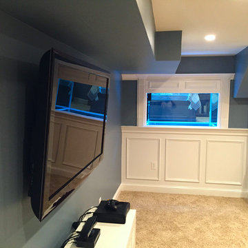 Basement renovation with Custom fish tank built in