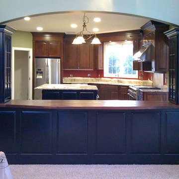 Kitchen with Innovative Pass-Through Storage Divider Between Kitchen & Family Rm