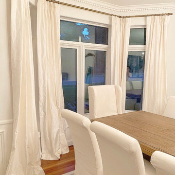 Silk Pleated Drapes In An Entertaining Ready Dining Space