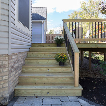 Deck and Unilock Paver Patio with Firepit & Landscaping