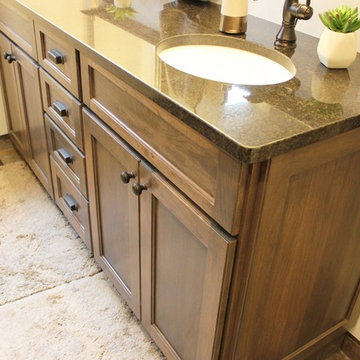 Moline, IL Bath Remodel With Gray Stained Cherry Vanity and Pebble Tiled Shower