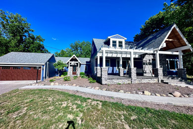 Example of an arts and crafts exterior home design in Other