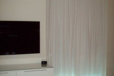 Beach style family room photo in Miami