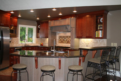 Inspiration for a mid-sized timeless u-shaped porcelain tile open concept kitchen remodel in Nashville with a double-bowl sink, shaker cabinets, beige cabinets, laminate countertops, beige backsplash, stone tile backsplash and stainless steel appliances