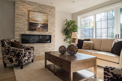 Example of a transitional family room design in Detroit