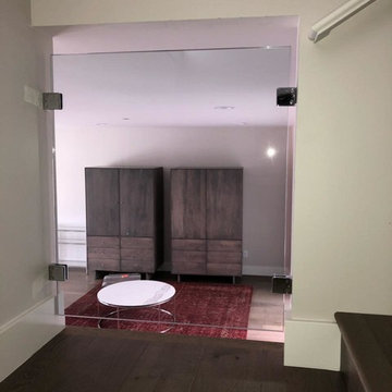 Glass Stairwell Landing/ Room Divider