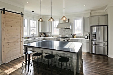 Inspiration for a modern kitchen remodel in Little Rock with recessed-panel cabinets and gray cabinets