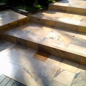 Backyard sun deck and stair access