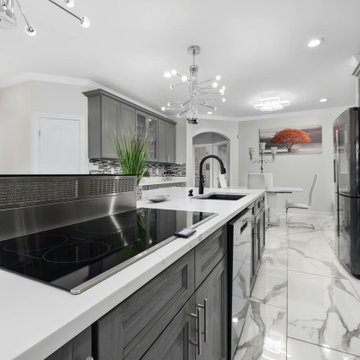 High-Gloss Luxe: Sleek Gray Kitchen with Bold Modern Touches
