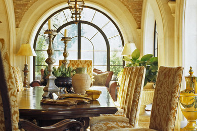 Enclosed dining room - large mediterranean beige floor enclosed dining room idea in Los Angeles with beige walls and no fireplace