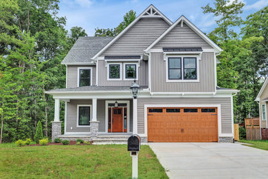 Example of a farmhouse exterior home design in Richmond