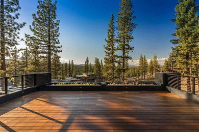 Deck - modern rooftop deck idea in Sacramento with a fire pit