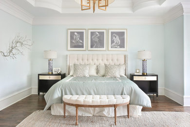 Bedroom - large contemporary master medium tone wood floor and brown floor bedroom idea in Atlanta with green walls and no fireplace