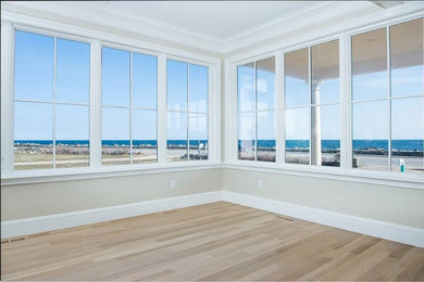Example of a beach style home design design in Boston