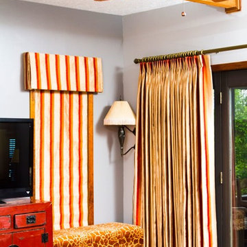 Family room cordless roman shades, valances and wide panels for Indy home