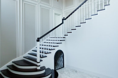 Inspiration for a traditional l-shaped staircase in Moscow with wood railing.