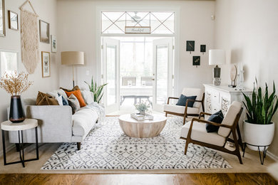Inspiration for a mid-sized formal and open concept carpeted and beige floor living room remodel in Tampa with beige walls, no fireplace and no tv