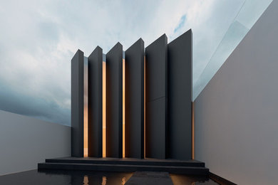 Design ideas for a contemporary black exterior in Melbourne.