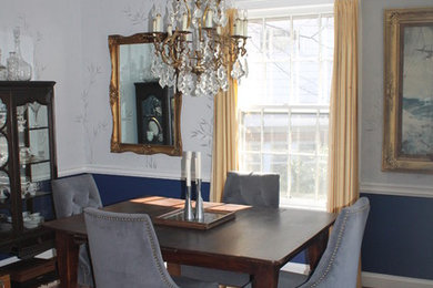 Enclosed dining room - mid-sized eclectic medium tone wood floor enclosed dining room idea in DC Metro with gray walls