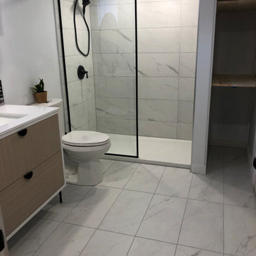 Tile install process including under tile waterproofing