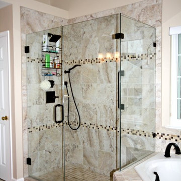 Master Bathroom with Frameless Shower and Jetted Tub