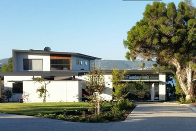 Photo of a contemporary home design in Hobart.