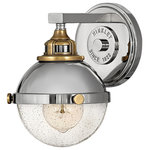 Hinkley Lighting - Fletcher Wall Sconce in Polished Nickel - Fletcher's chic vibe transcends style boundaries. A seamless dome shade features a cast-fitter and an elegant capture ring that secures the clear seedy glass with decorative cast knobs. Spanning vintage to industrial classic to transitional Fletcher seamlessly unifies any decor declaration. Its two-tone finishes come in Polished Nickel with Heritage Brass or Black with Heritage Brass.