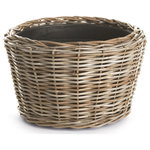 Napa Home & Garden - Woven Dry Basket Planter, 21.25" - Here's a smart idea- a new rattan planter tightly woven around grower's pots. The plastic pot helps the weave retain shape while elevating the rattan off the ground. Brilliant.