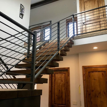 Eagle Landing - Floating Mono Beam Staircase & Horizontal Railings