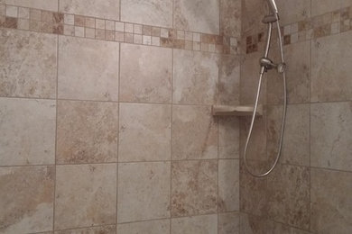 Bathroom - mid-sized mosaic tile floor bathroom idea in Tampa