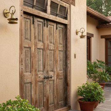 Carved Barn Doors: A Statement Piece for Your Library and Home Studio