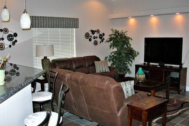 Family room - transitional family room idea in Other