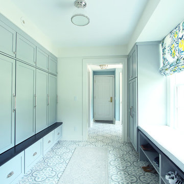 Light Blue Cabinets in Mudroom with Patterned Floor Tile