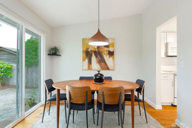 Example of a 1950s dining room design in Seattle