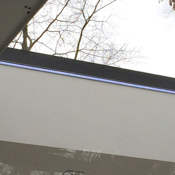 Multi-color LED Light Strip above an Outdoor Spa