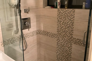 Example of a mid-sized classic beige tile and porcelain tile porcelain tile and beige floor alcove shower design in Sacramento with beige walls, a drop-in sink and a hinged shower door