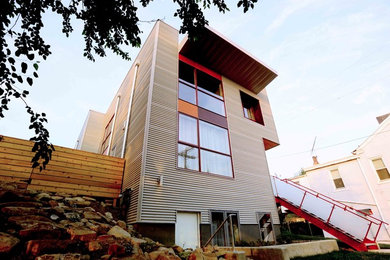 Example of a minimalist exterior home design in Other