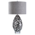 StyleCraft - Caldonia Table Lamp Silver Finish On Ceramic Body With Crystal Base - Transform interior spaces with the distinctive Harp and Finial Caldonia Table Lamp, which mimics an upscale and modern web of molten metal. The open ceramic body exhibits a silver metallic finish and sits atop a crystal base, complete with a hardback shade. Include this showstopper of a table lamp in the foyer, living room, or hallway for a definitive touch.