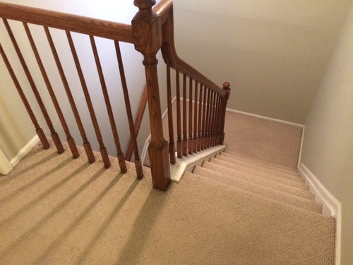 How To Install Laminate Under Baers, How To Install Hardwood Flooring On Stairs With Spindles