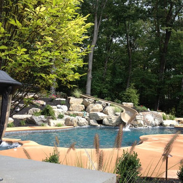 Stroud Township salt water pool with spa, sunshelf, slide, and waterfall