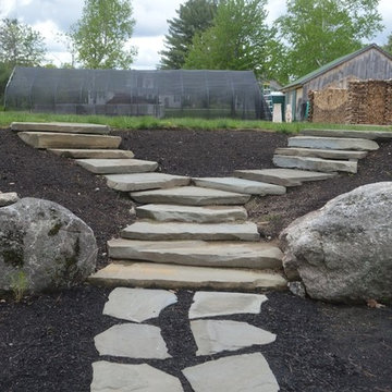 Irregular Bluestone Steps with Boulder Style Stone Wall