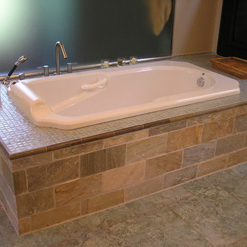 Glass and Stone Tiled Soaking Tub