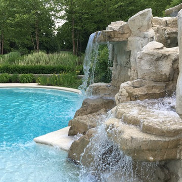 Cedar Rapids, Iowa - Custom Concrete Swimming Pool with Rock Waterfall Feature